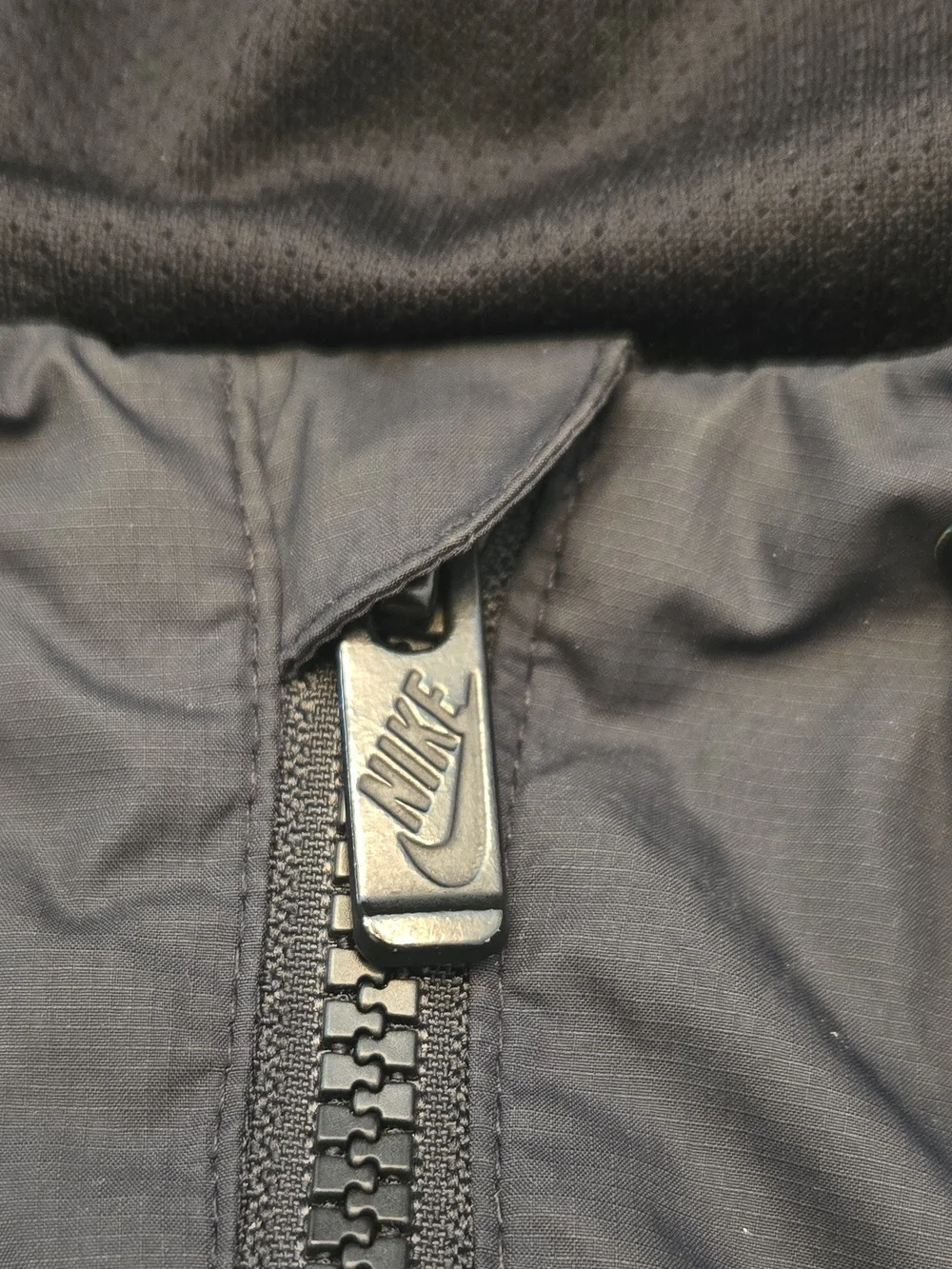 Nike Black Hooded Windbreaker with White Swoosh